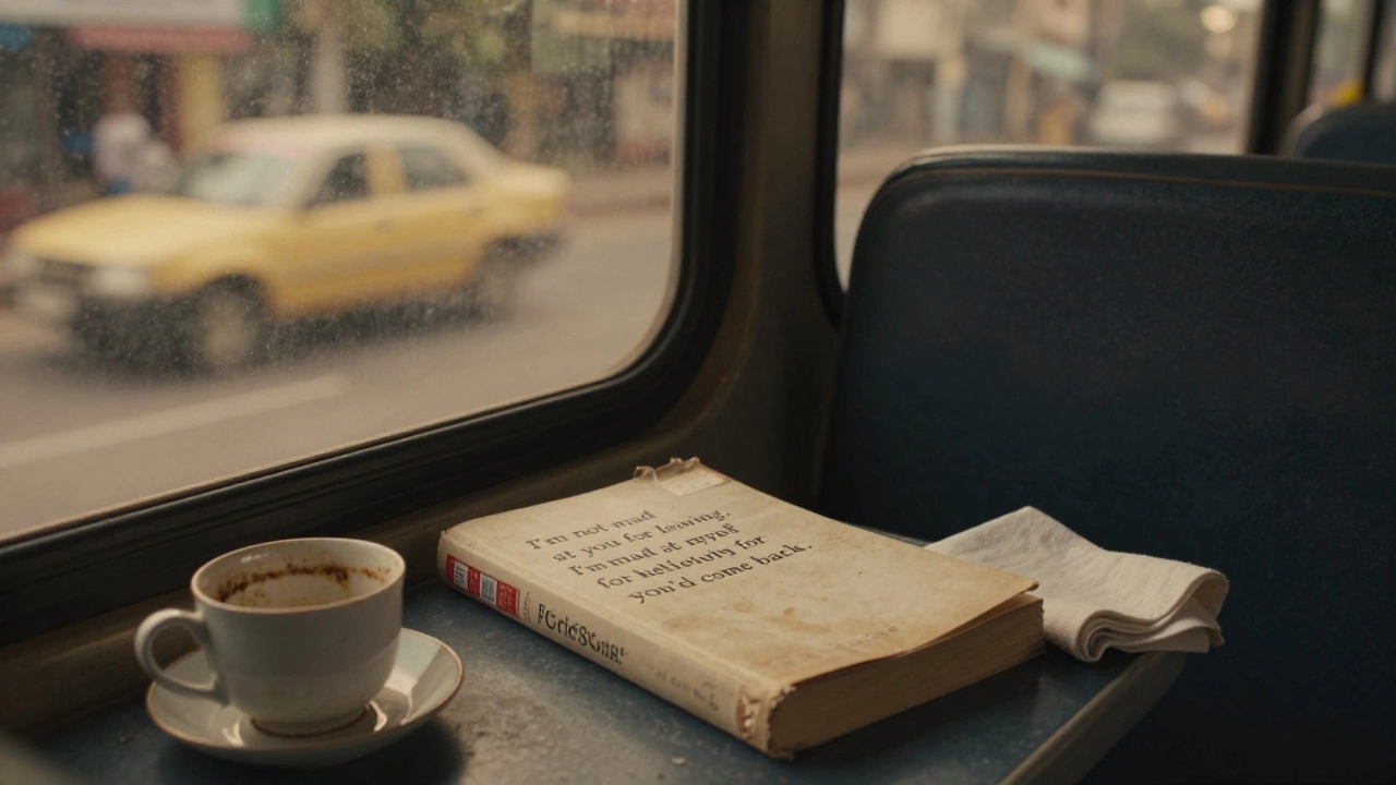 An old bus ticket with a heartfelt message tucked inside a book on a bus seat, evening light outside.