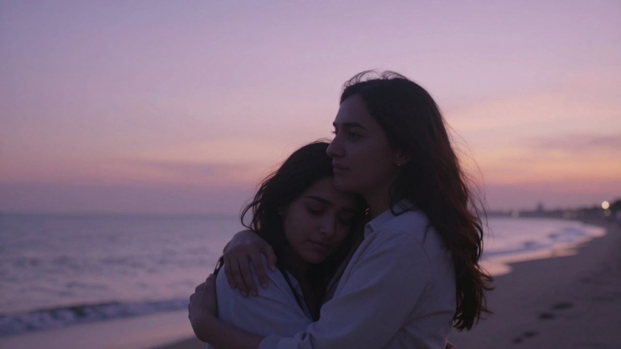 Two female friends hugging emotionally during a Mumbai sunset